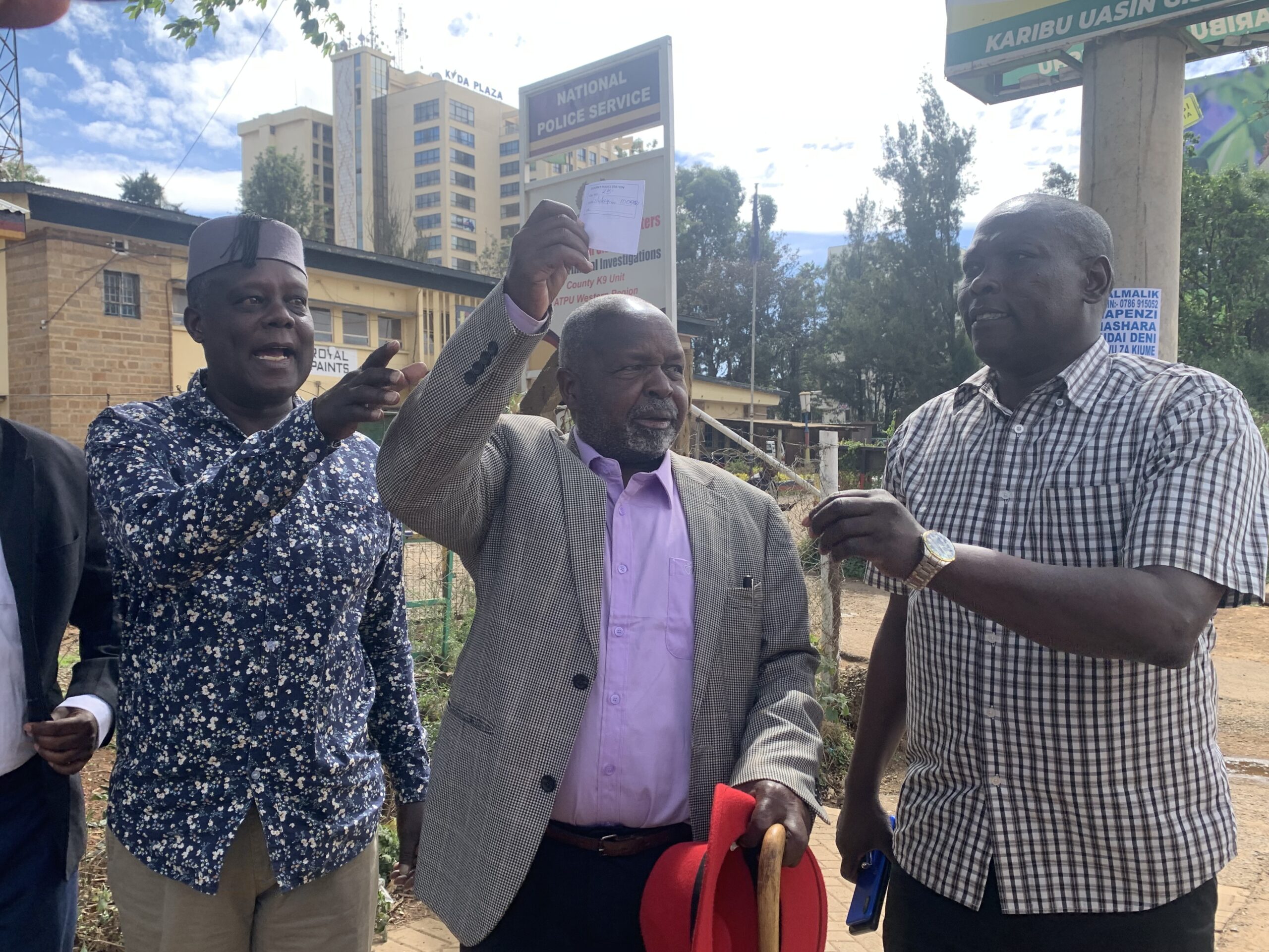 Mzee William Centre and Human rights activist Kimutai Kirui right outside the Eldoret Central police station