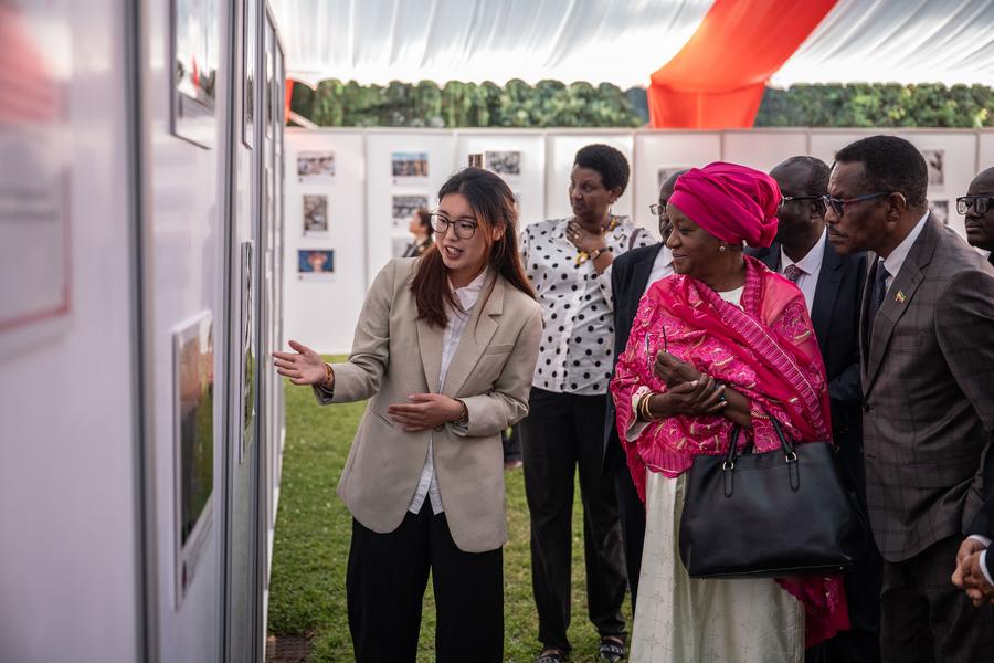 Zainab Hawa Bangura (2nd R), director-general of the United Nations Office at Nairobi, visits a news photo exhibition titled "Lens of Xinhua, Images of the Century" in Nairobi, capital of Kenya, Feb. 12, 2025. (Xinhua/Wang Guansen)